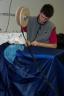 kevin sewing blue fabric